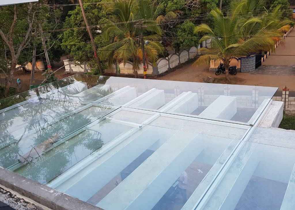 pergola glass wall in kerala